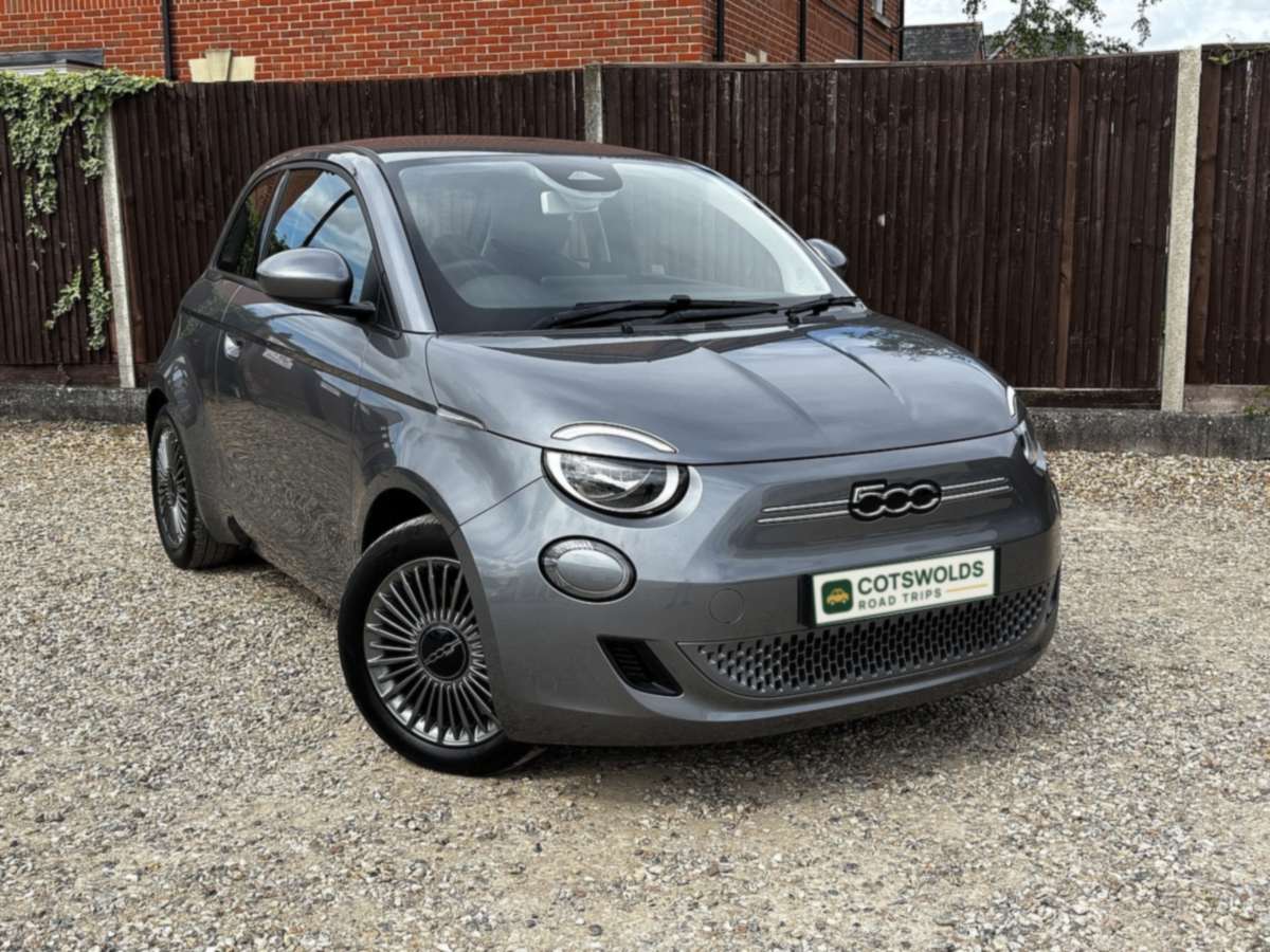 Grey Fiat 500e electric hatchback, front three-quarter view